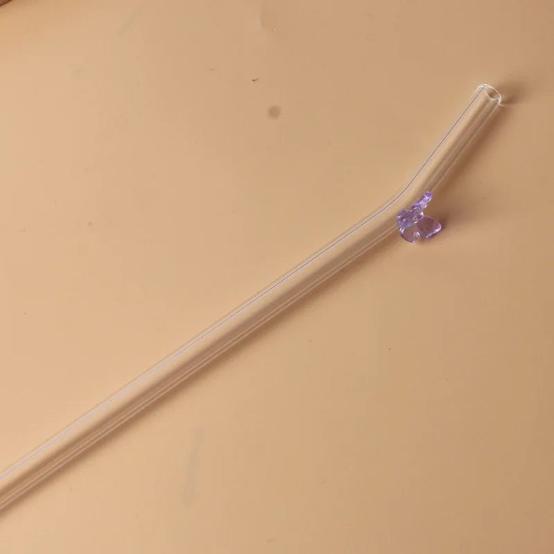 Glazen rietje met vlinder