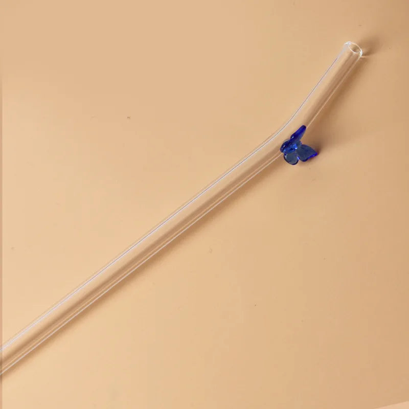 Glazen rietje met vlinder