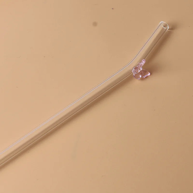 Glazen rietje met vlinder