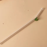 Glazen rietje met vlinder