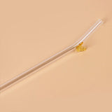 Glazen rietje met vlinder