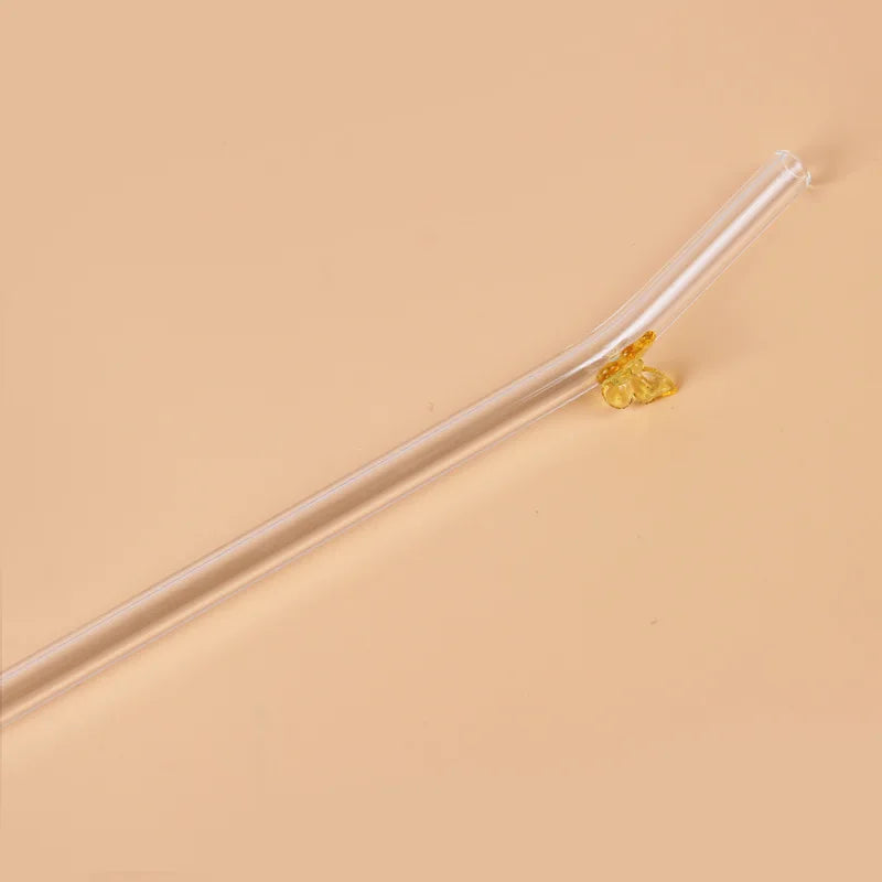 Glazen rietje met vlinder